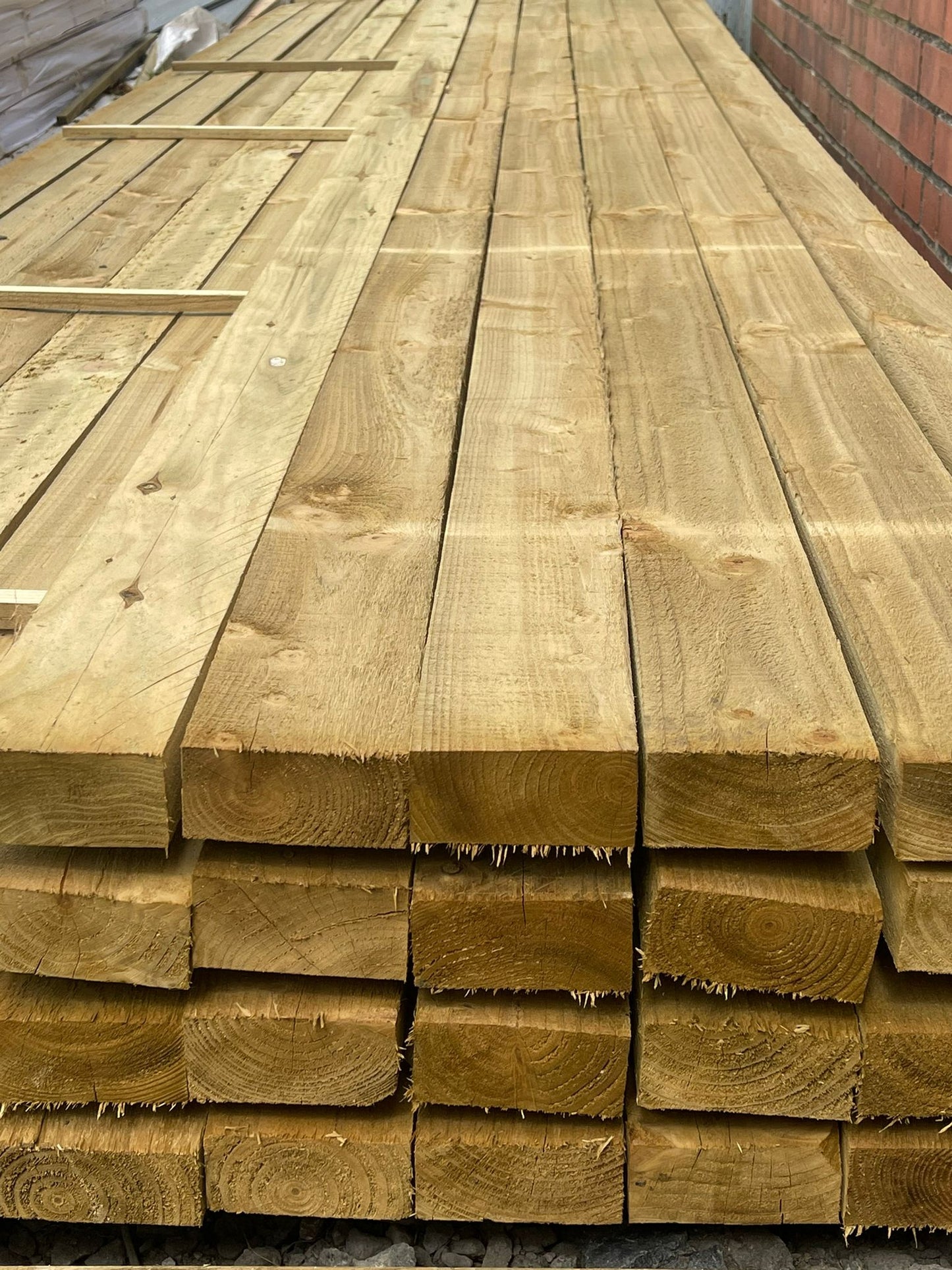 A pack of 4 x 2 Joists ready for delivery in The Grass Yard Paisley.