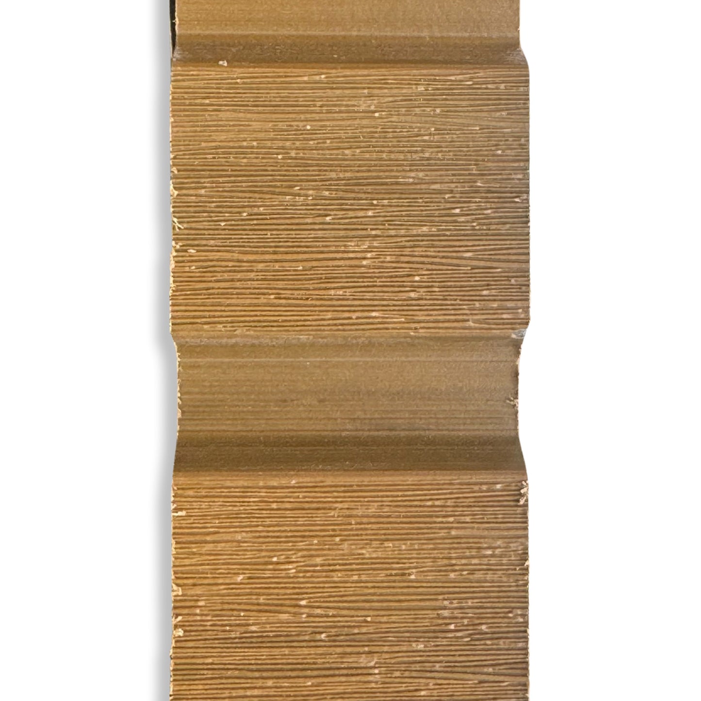 A sample size of cedar composite slatted fencing, close up showing the grain on the board.