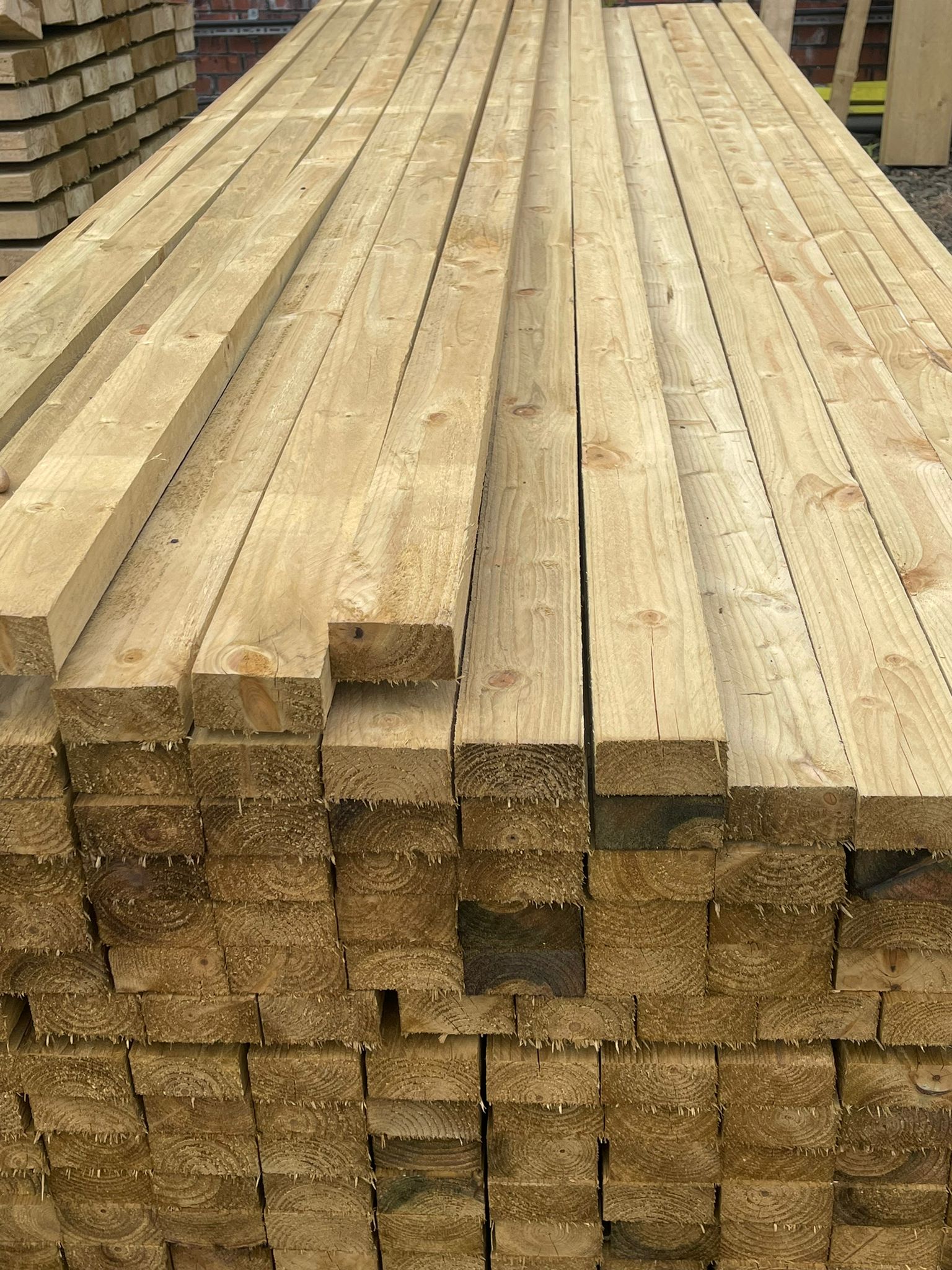 A pack of wooden fence rails in The Grass Yard ready for collection.