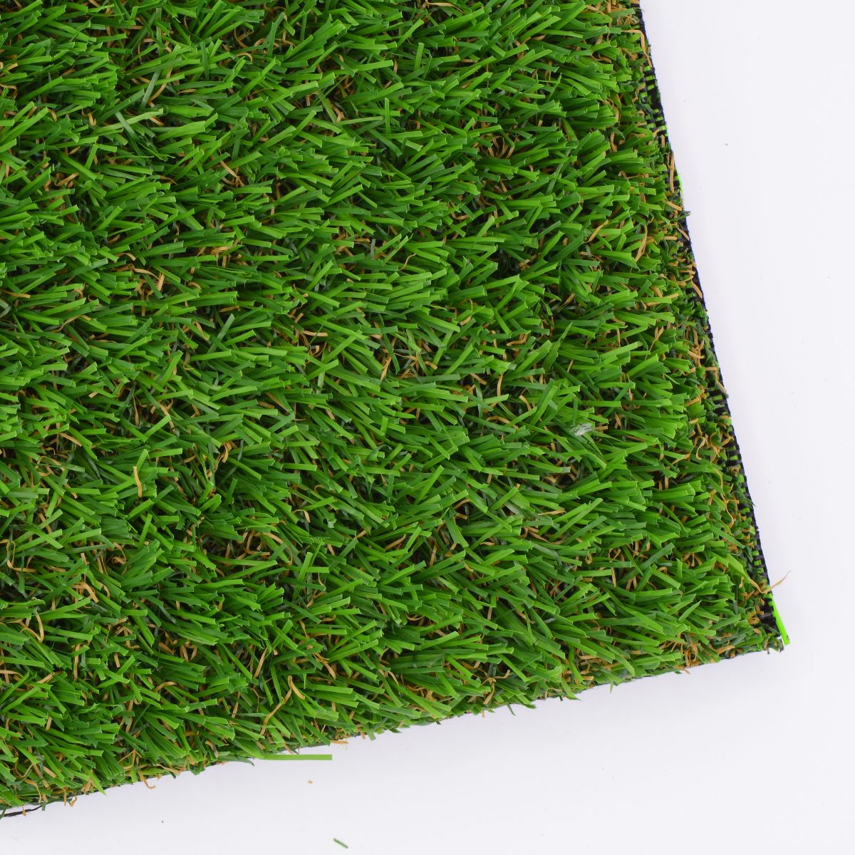 Close-up of 30mm artificial grass with a white background