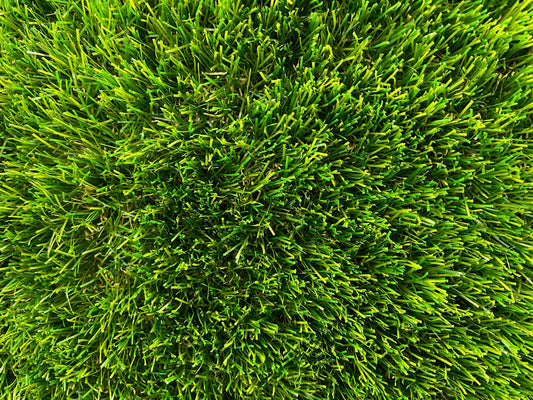 Ailsa Craig artificial lawn grass pictured from above showing the density of the pile and vibrant green artificial grass blades.