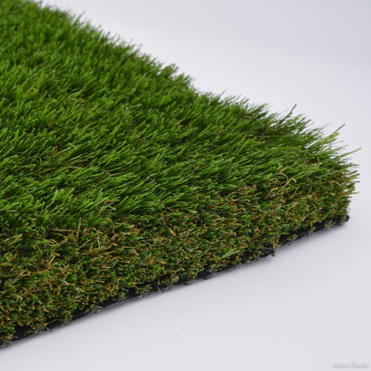 Super Close-up of artificial grass on a white background