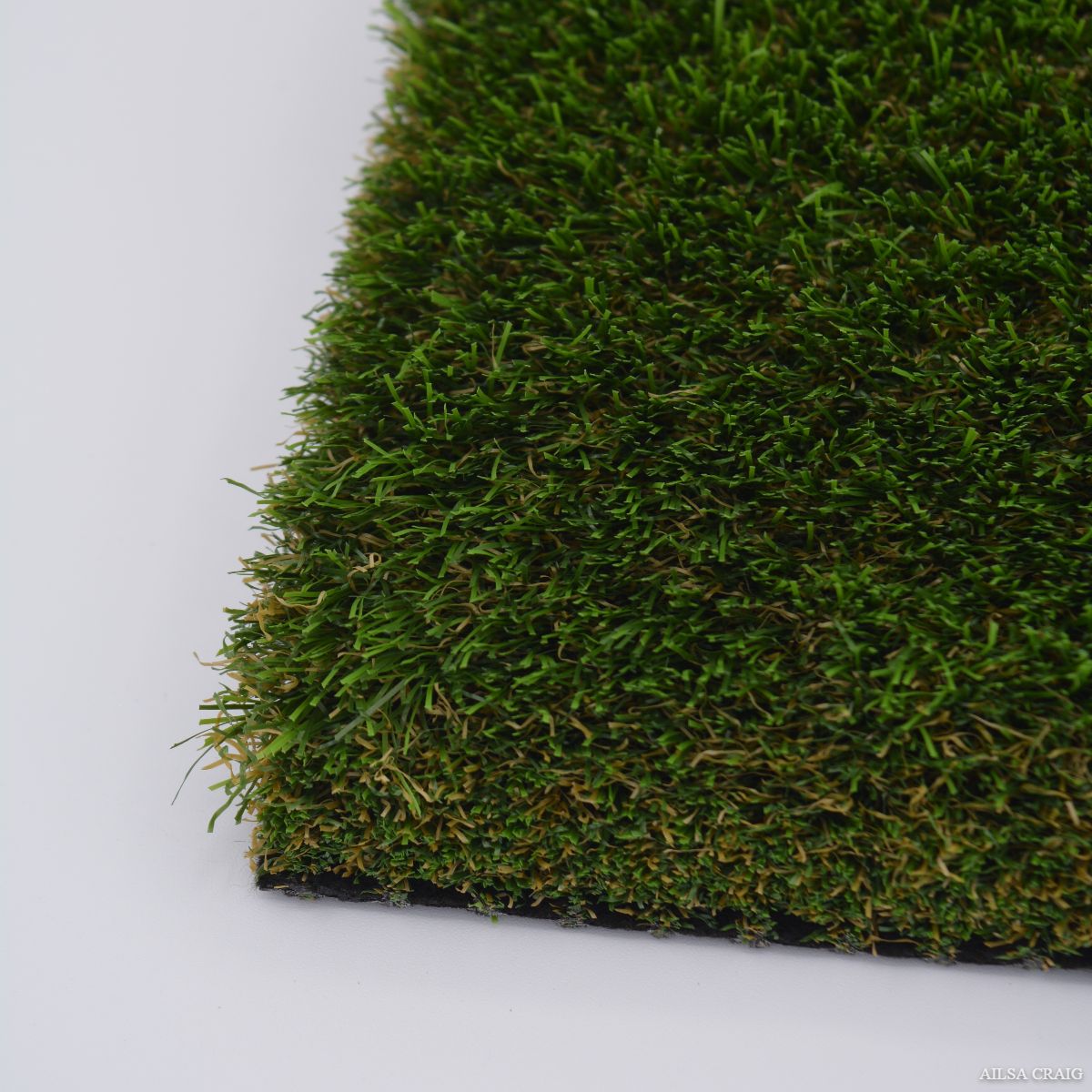 Artificial grass sample with a white background