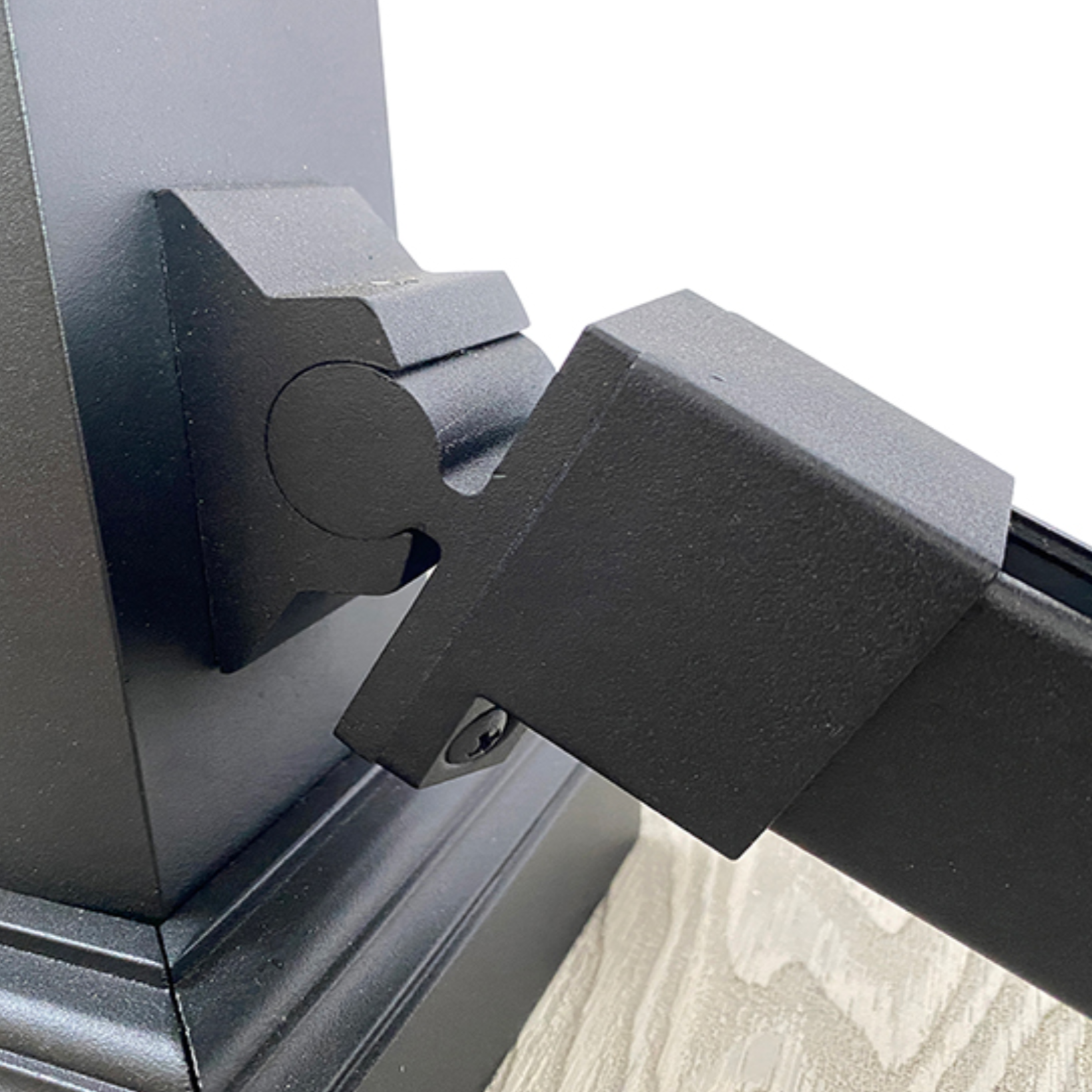 A close up of aluminium balustrade bottom bracket.