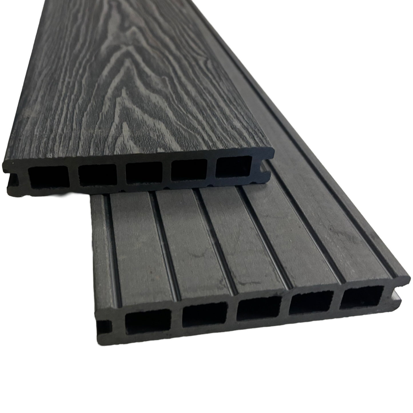 Two anthracite composite decking boards showing the wood grain and end profile.