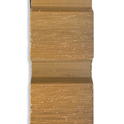 A sample size of cedar composite slatted fencing, close up showing the grain on the board. 