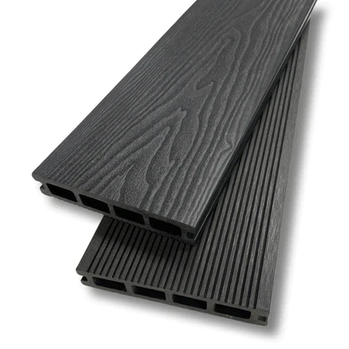 A sectional picture of a 5m composite decking board in charcoal, with wood grain finish.