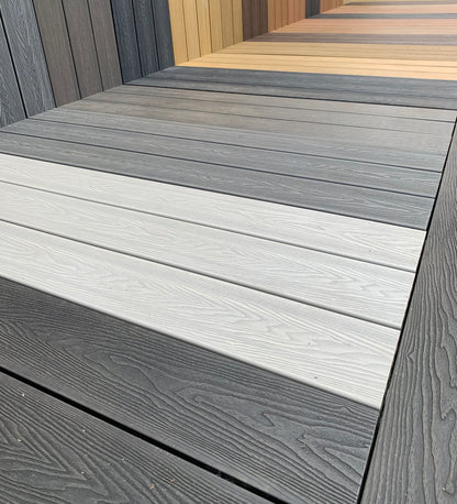 A display of the various different coloured composite decking boards within The Grass Yard.