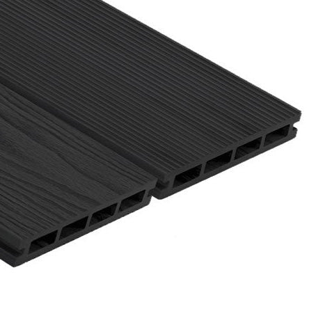 A modern composite decking installation with dark grey wood-like appearance.