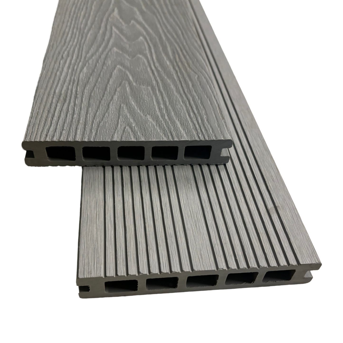 Two dove grey composite decking boards showing the end profile and either side of the boards as well as the wood grain.