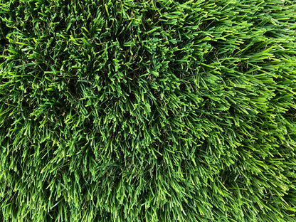 Dunn 40mm artificial grass pictured from above looking down in the green fake grass blades.