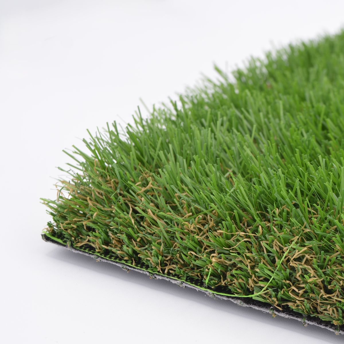 Close-up of Dun artificial grass with a white background