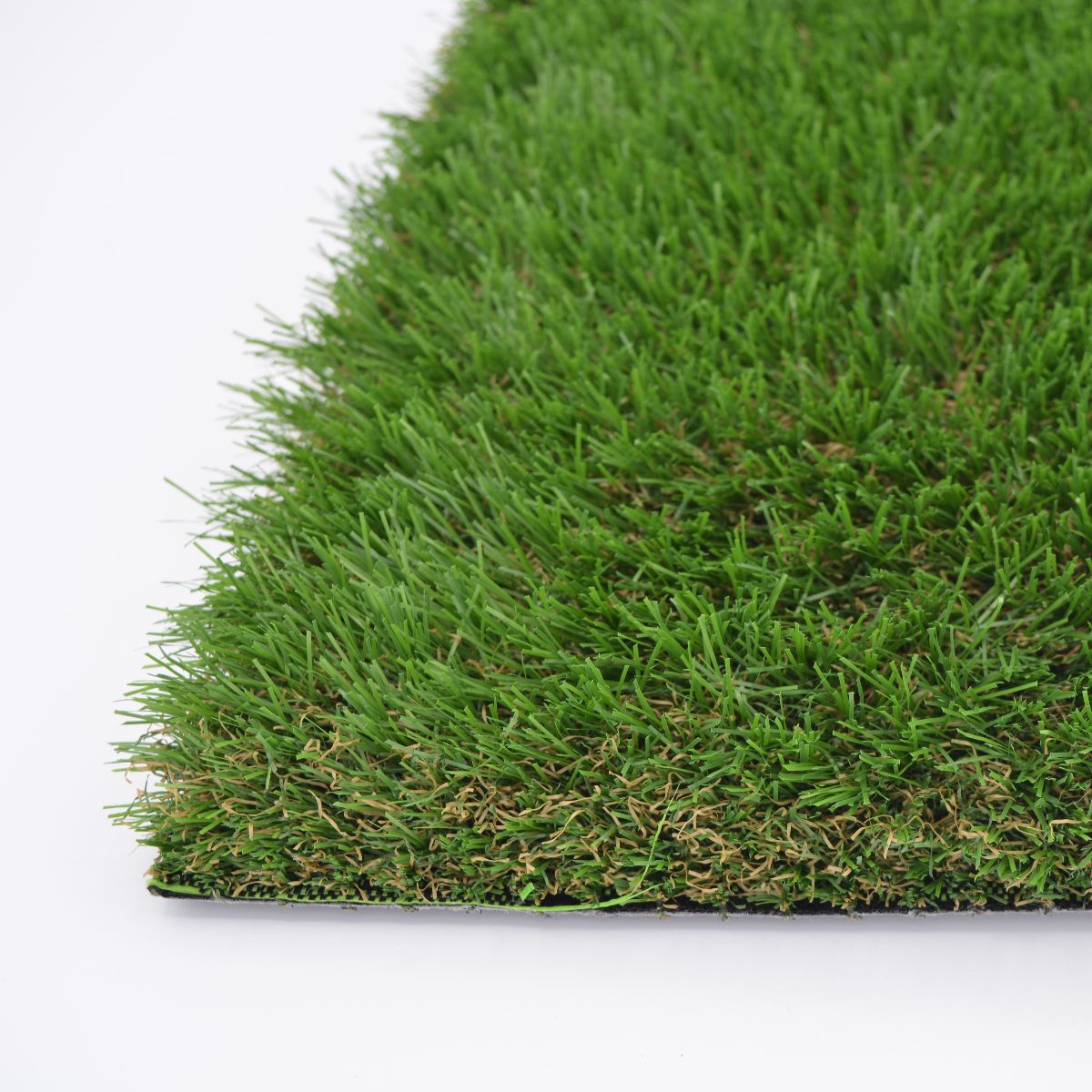Close-up of Dun artificial grass showing the side profile & density