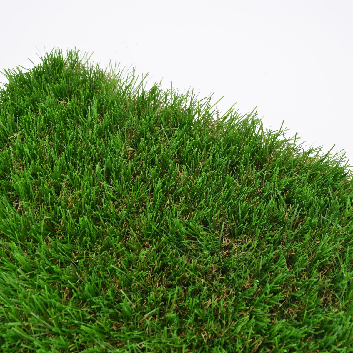 Close-up of Dun artificial grass sample with a white background