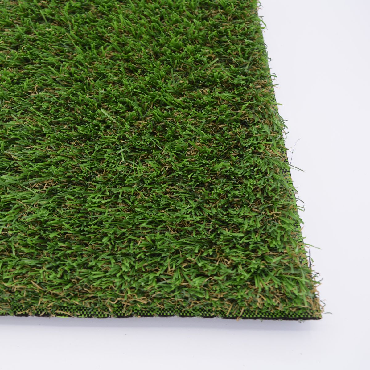 Close-up of eday artificial grass with a white background