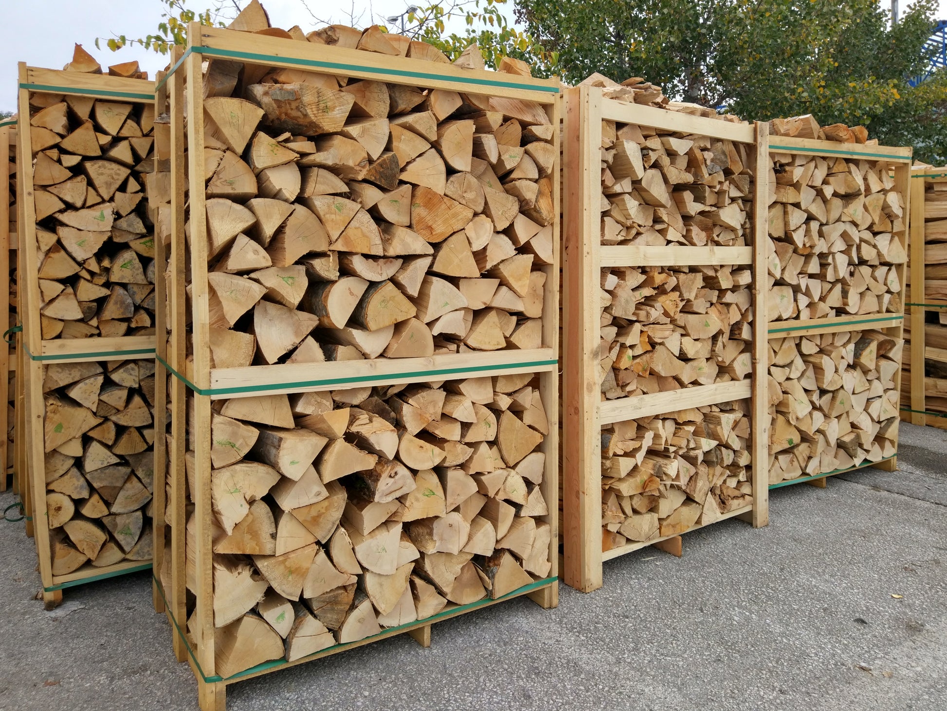 Large crates of birch firewood waiting for delivery.