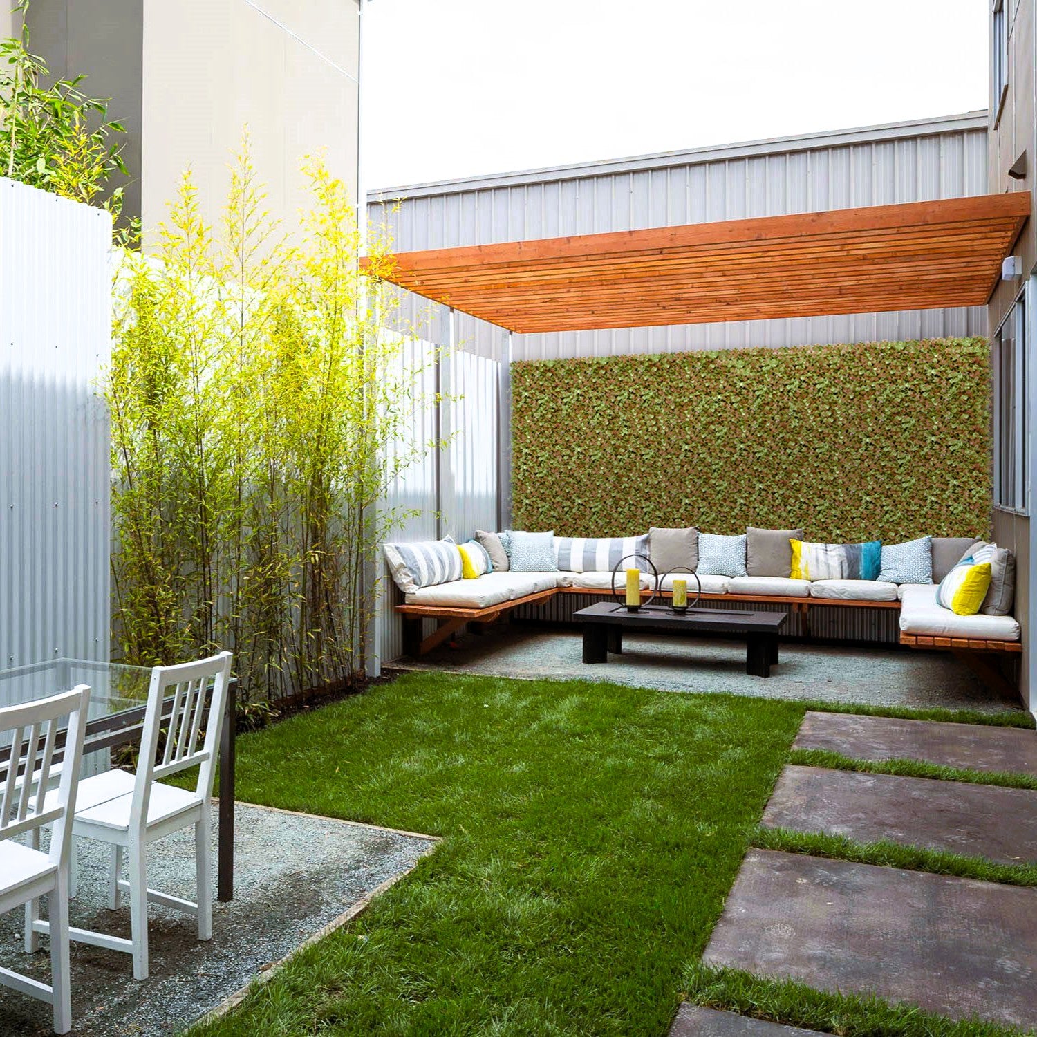 Artificial green wall panels Peachy Keen installed outdoor garden