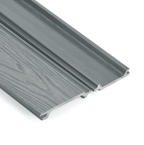 Grey composite shplap clading on white background.