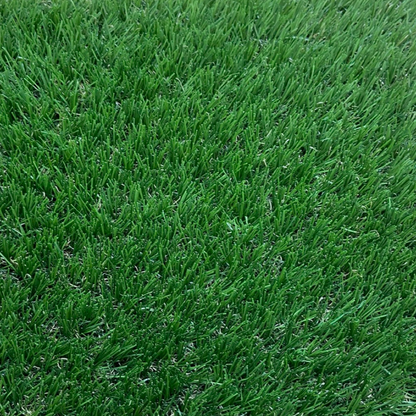 A close up picture of Scalloway dog or K9 fake grass showing the deep dark green artificial grass blades.