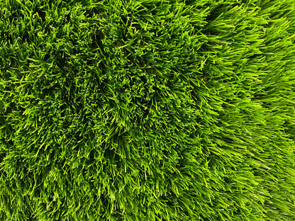 An up close shot of St Kilda artificial grass highlighting the vibrant green colours in the 37mm synthetic grass blades.