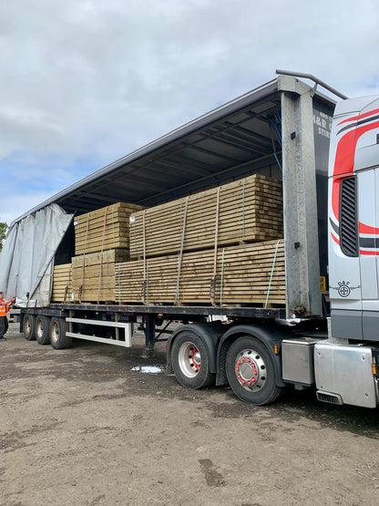 A delivery of fencing and decking materials into The Grass Yard. 