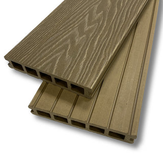 A picture of light oak composite decking showing the end profile and wood grain.