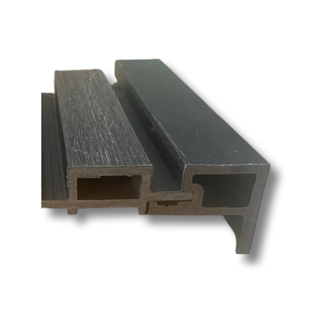 Side profile of a slatted composite cladding end trim and panel in charcoal.