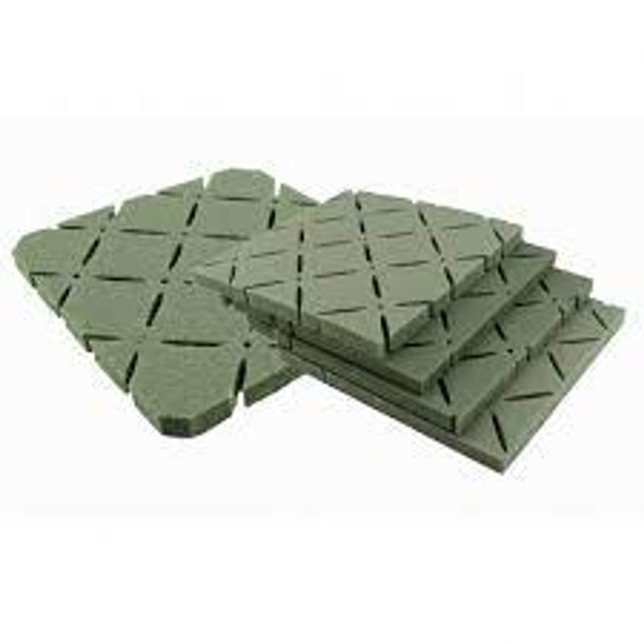 A small pile of green artificial grass shock pad.